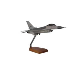Hand-carved mahogany model of the General Dynamics F-16A Fighting Falcon on wooden display stand